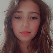 Mila participe au concours pour gagner de l'argent avec cette photo : beautiful, casual, child, closeup, expressionless, eyebrows, face, girl, headshot, indoor, lips, long_hair, natural_light, person, portrait, serene, skin, soft_lighting, wavy_hair, young