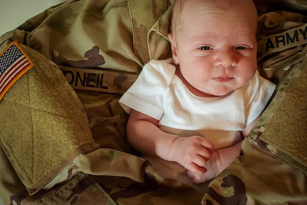 Kaisen is registered to the contest to win money with this photo: baby, baby_products, baby_safety, baby_toddler_clothing, cheek, child, comfort, couch, happy, iris, linens, pattern, person, portrait_photography, sitting, skin, sleeve, smile, t_shirt, toddler