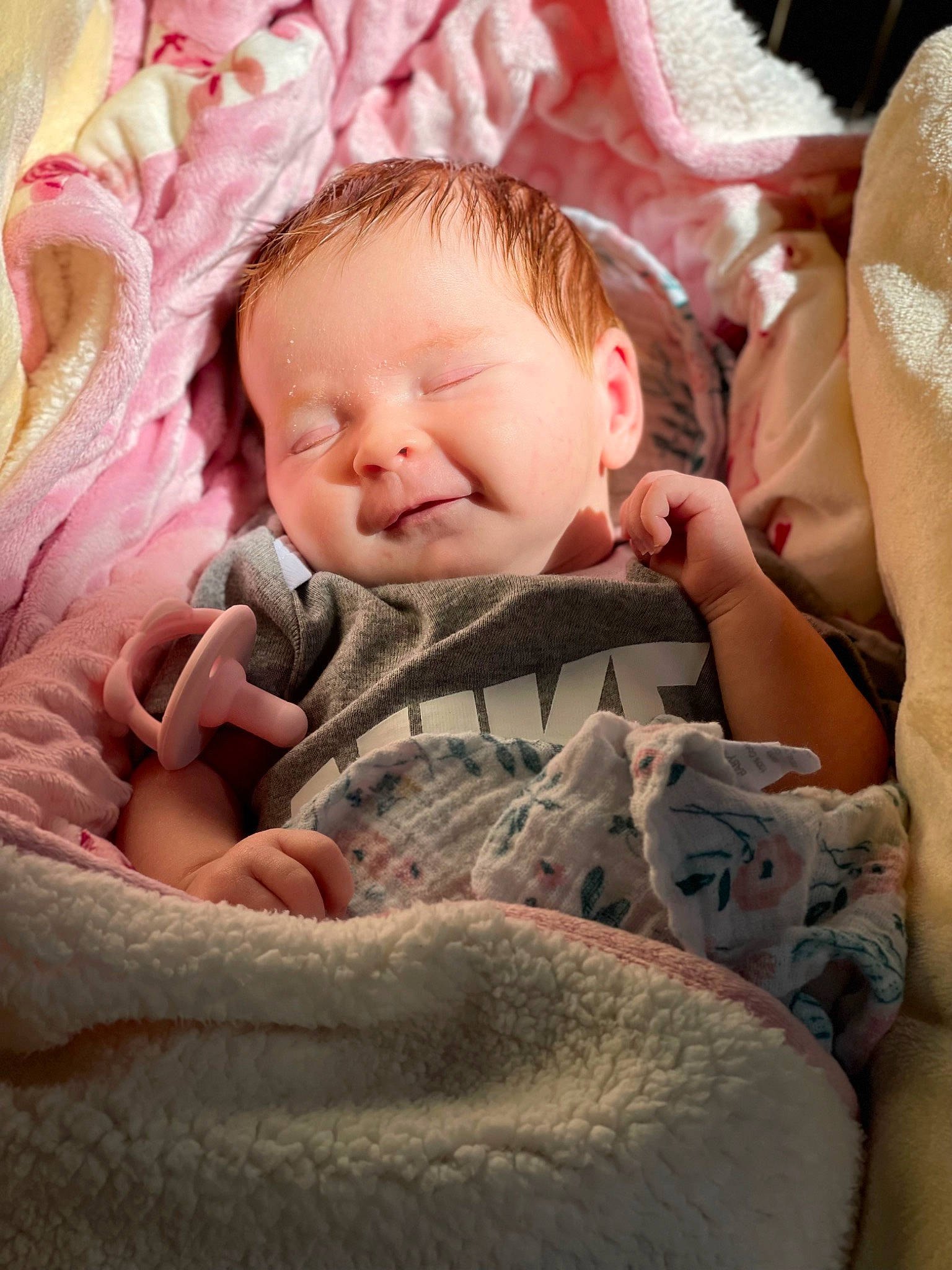 Khalani joined the competition — help win amazing prizes! baby, baby_products, baby_toddler_clothing, cheek, child, chin, comfort, eye, finger, grass, happy, head, linens, pattern, person, pink, product, skin, smile, textile