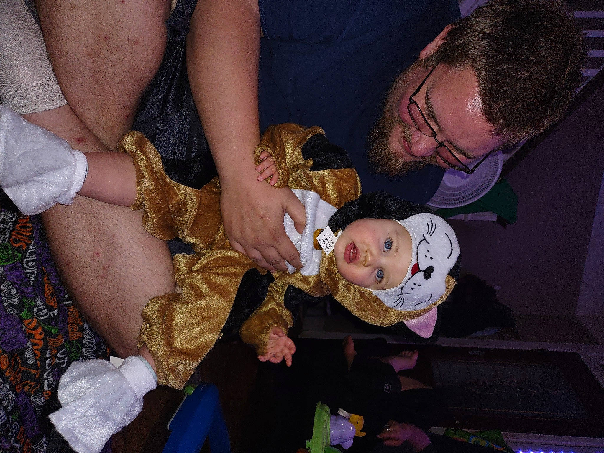 Haylee is registered to the contest to win money with this photo: baby, child, event, eyewear, face, formal_wear, fun, glasses, happy, headwear, human_body, jewellery, lap, party, pattern, person, sitting, tie, toddler, tradition