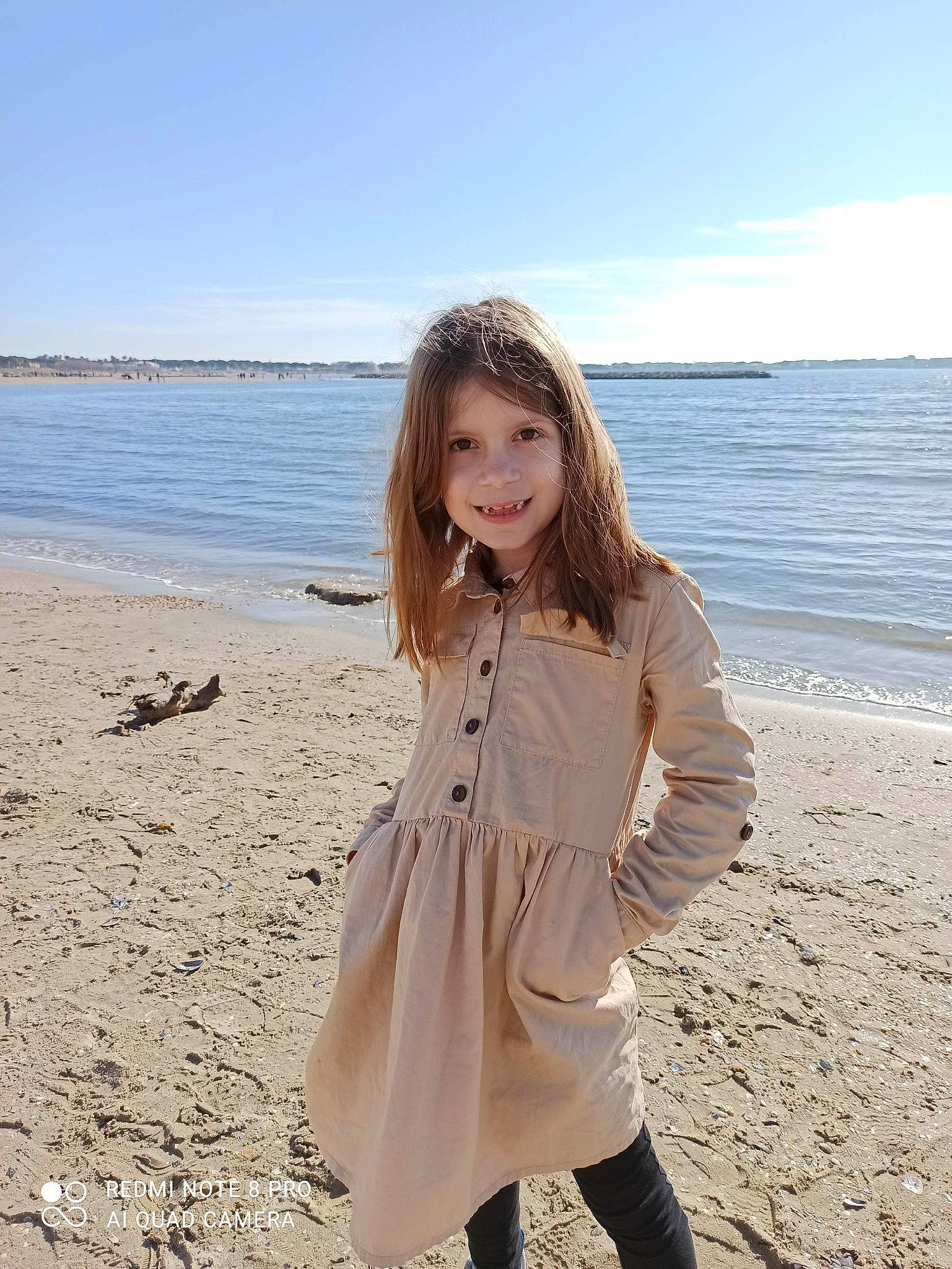 Eden participe au concours pour gagner de l'argent avec cette photo : beach, beauty, blond, cloud, dress, flash_photography, fun, happy, jacket, joy, lake, landscape, long_hair, outerwear, people_in_nature, person, sky, sleeve, smile, street_fashion
