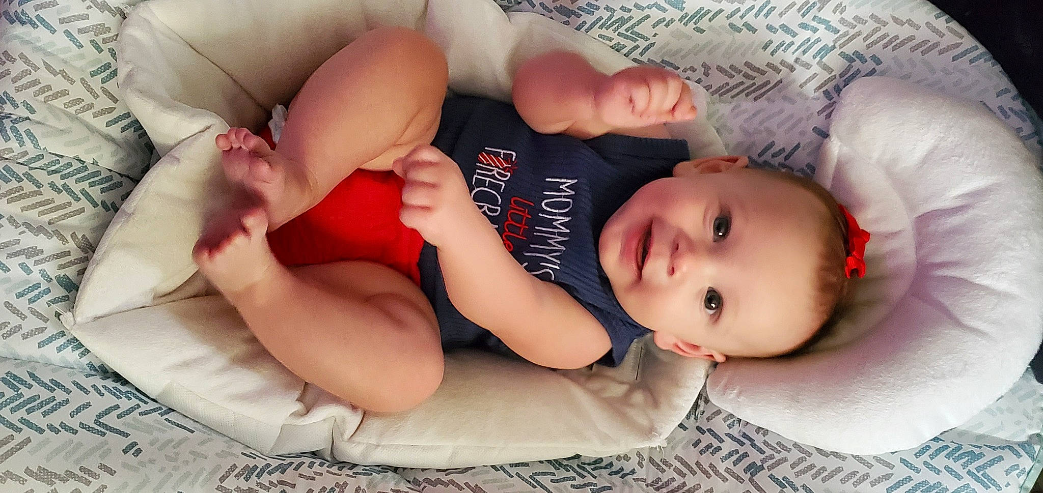 Freya is registered to the contest to win money with this photo: abdomen, arm, baby, baby_toddler_clothing, chest, comfort, eye, finger, hand, head, human_body, joy, knee, mouth, muscle, person, skin, smile, stomach, thigh