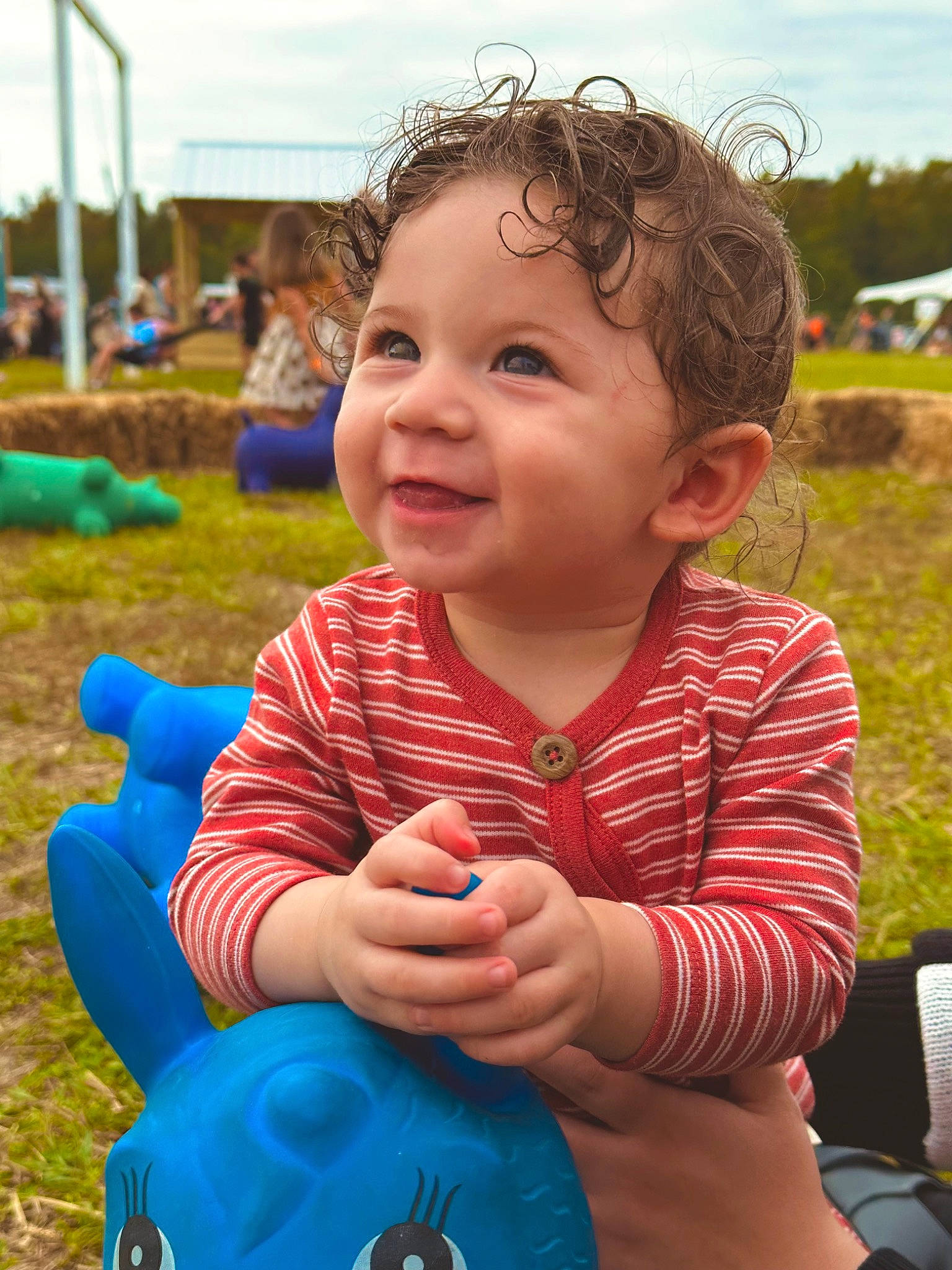 Elliot is registered to the contest to win money with this photo: baby, baby_toddler_clothing, blue, child, city, electric_blue, eye, fun, grass, happy, human_body, joy, leisure, nose, person, public_space, recreation, skin, sky, smile