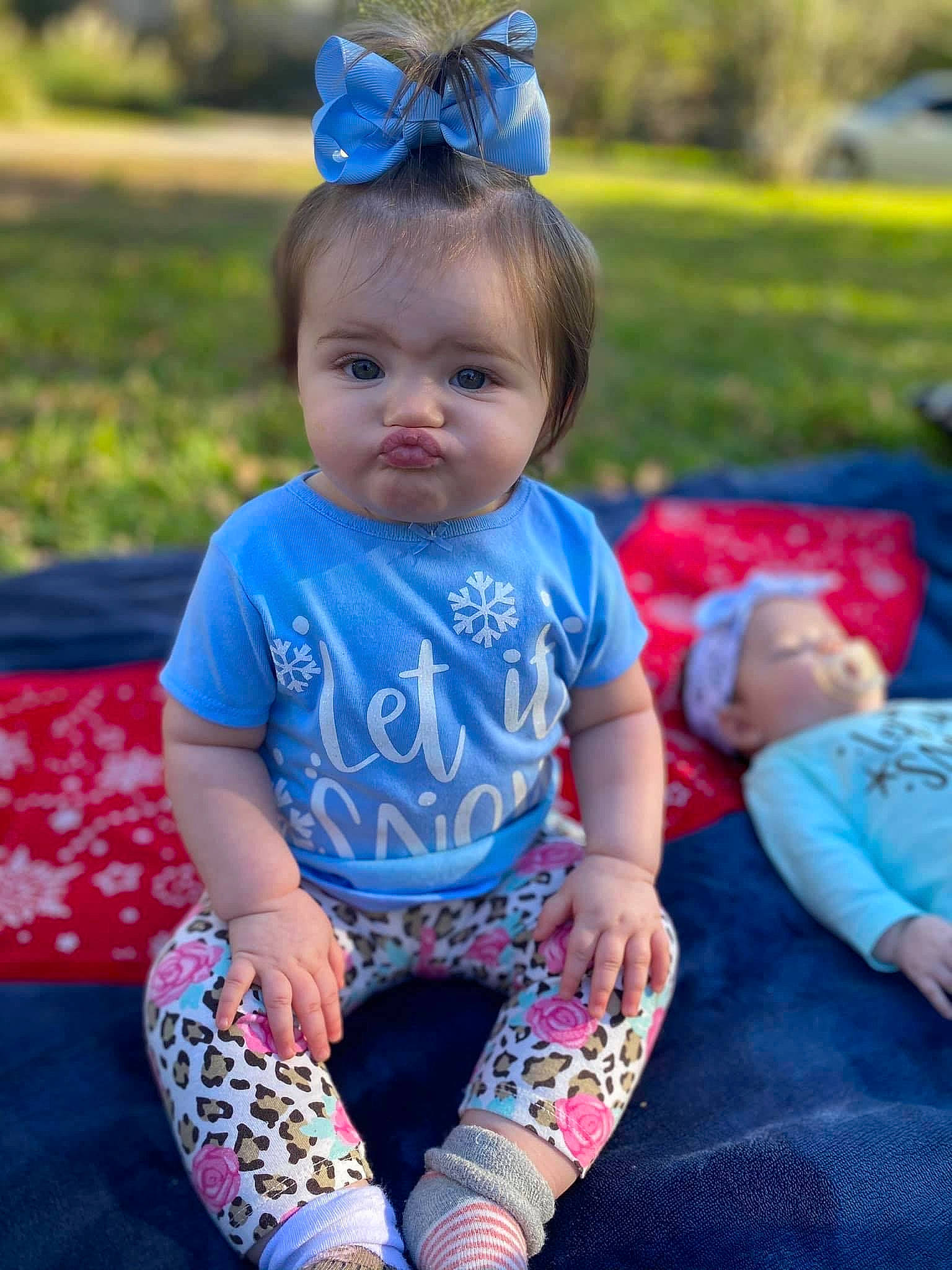 Kynleigh is registered to the contest to win money with this photo: aqua, azure, baby, baby_toddler_clothing, blue, child, cool, electric_blue, fun, grass, hairstyle, happy, headpiece, mammal, person, pink, plant, purple, sleeve, summer