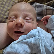Jaxson joined the competition — help win amazing prizes! baby, newborn, infant, face, skin, blanket, sleepy, closeup, soft, comfort, hand, clothing, person, head, resting, cute, small, peaceful, indoors, portrait