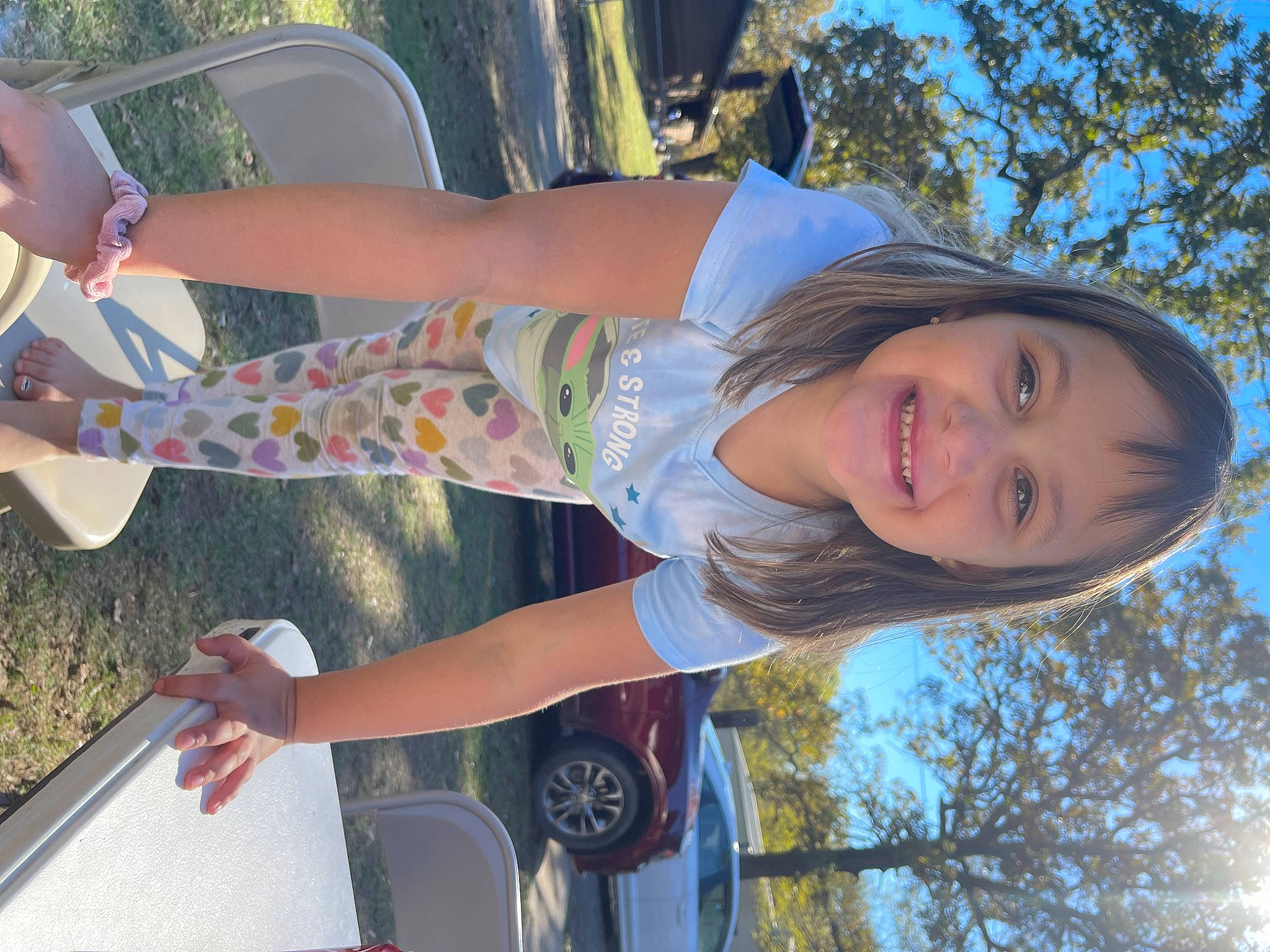 Mckinley joined the competition — help win amazing prizes! arm, automotive_lighting, car, cool, daytime, green, happy, human, joy, leaf, leisure, light, people_in_nature, person, photograph, sky, smile, tree, white, window