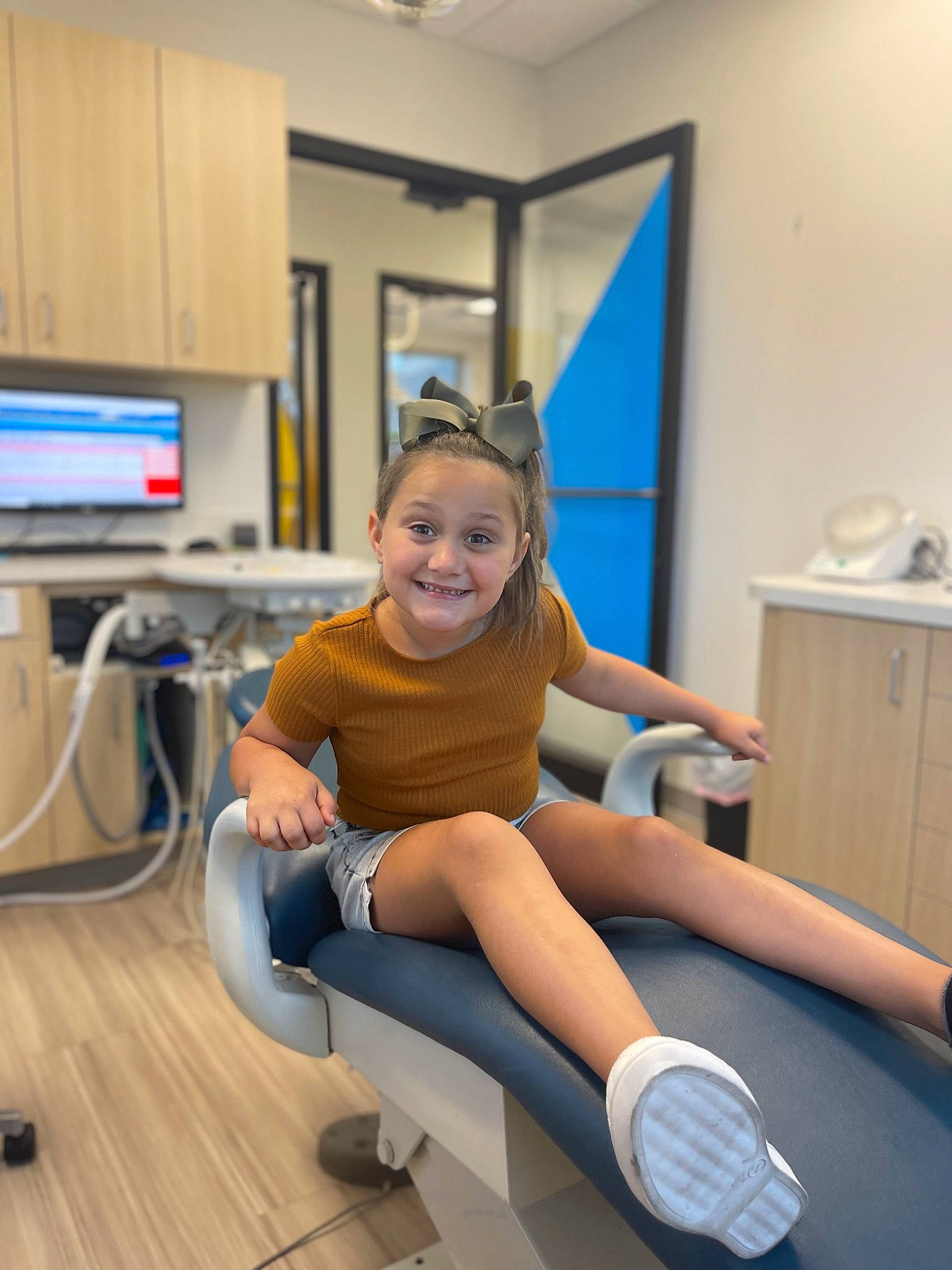 Mckinley joined the competition — help win amazing prizes! balance, electric_blue, flooring, human_leg, joint, joy, knee, leg, leisure, long_hair, person, physical_fitness, sandal, shoe, shorts, sitting, smile, sneakers, sock, sportswear