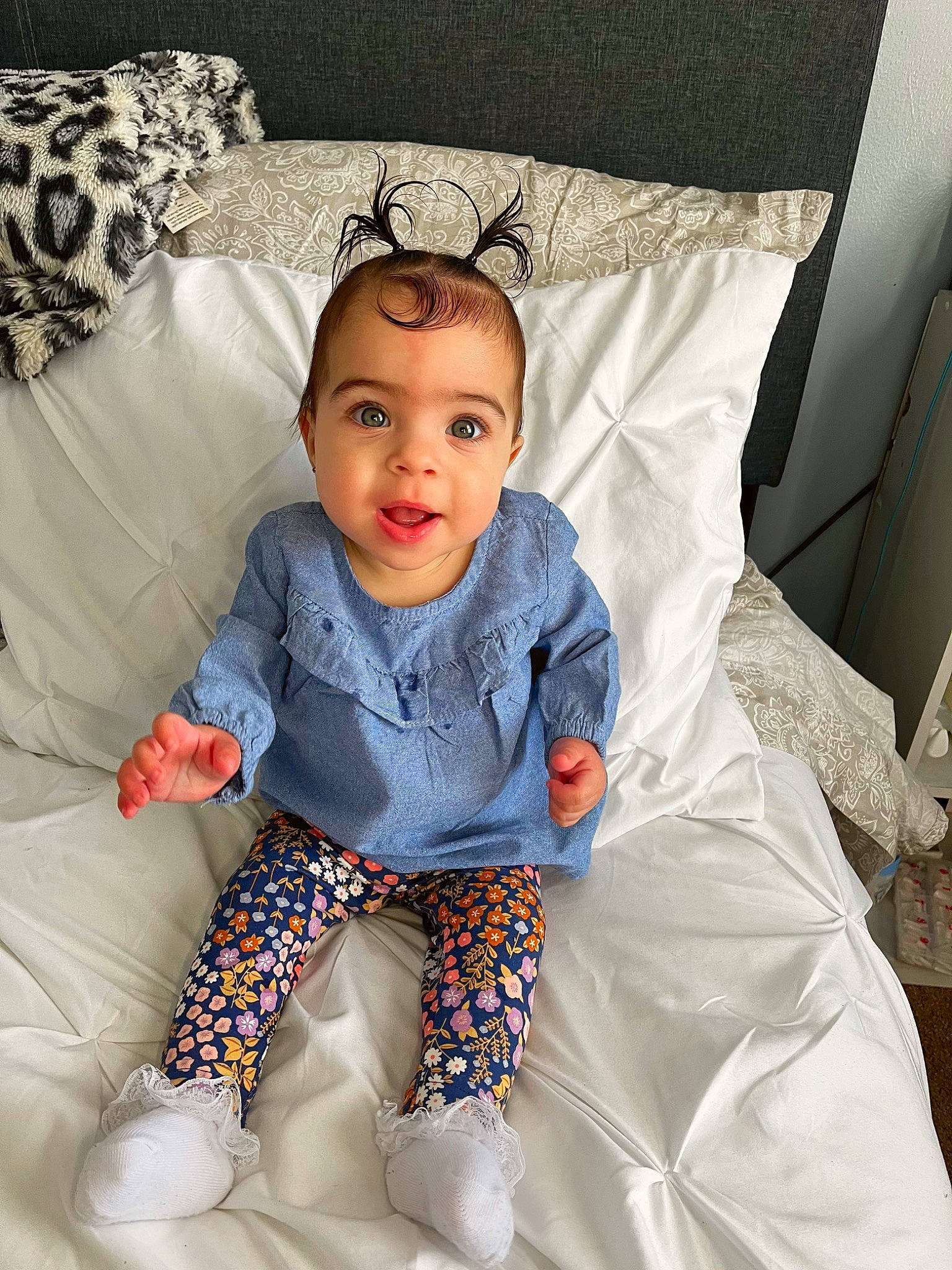 Jhené joined the competition — help win amazing prizes! baby, baby_toddler_clothing, child, comfort, cool, electric_blue, face, fashion_accessory, hairstyle, happy, head, linens, pattern, person, sitting, sleeve, smile, t_shirt, textile, throw_pillow