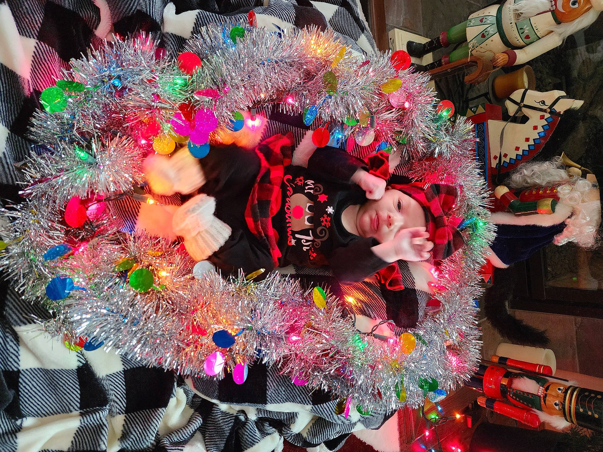 Dakota is registered to the contest to win money with this photo: chinese_new_year, christmas_decoration, costume, decoration, event, festival, fun, green, headwear, holiday, interior_design, magenta, mardi_gras, party_supply, person, pink, plant, public_event, smile, tradition