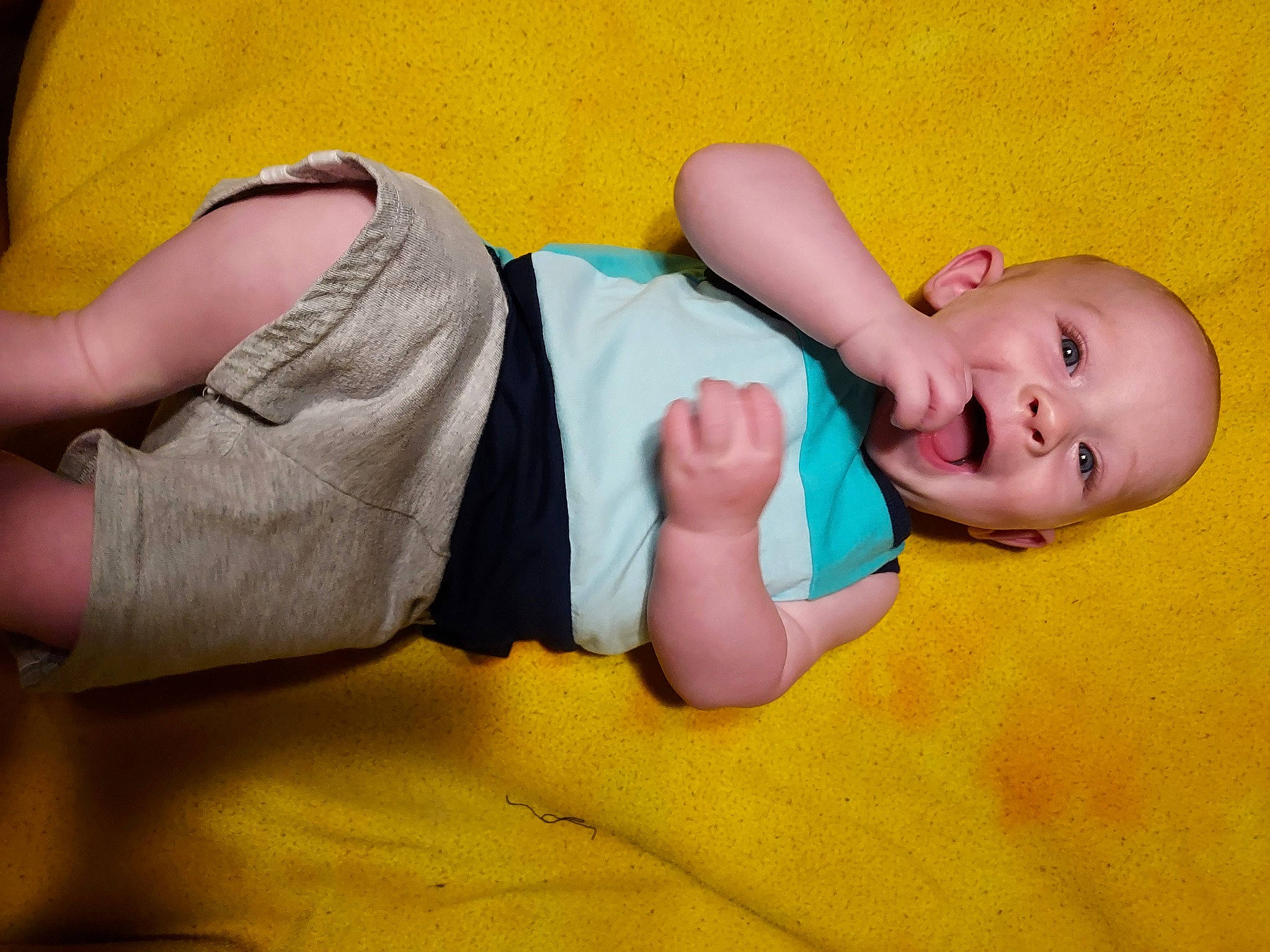 Wyatt is registered to the contest to win money with this photo: baby, baby_toddler_clothing, cheek, child, comfort, finger, foot, fun, hand, human_body, human_leg, leg, nail, person, sitting, skin, thigh, thumb, toddler, wood