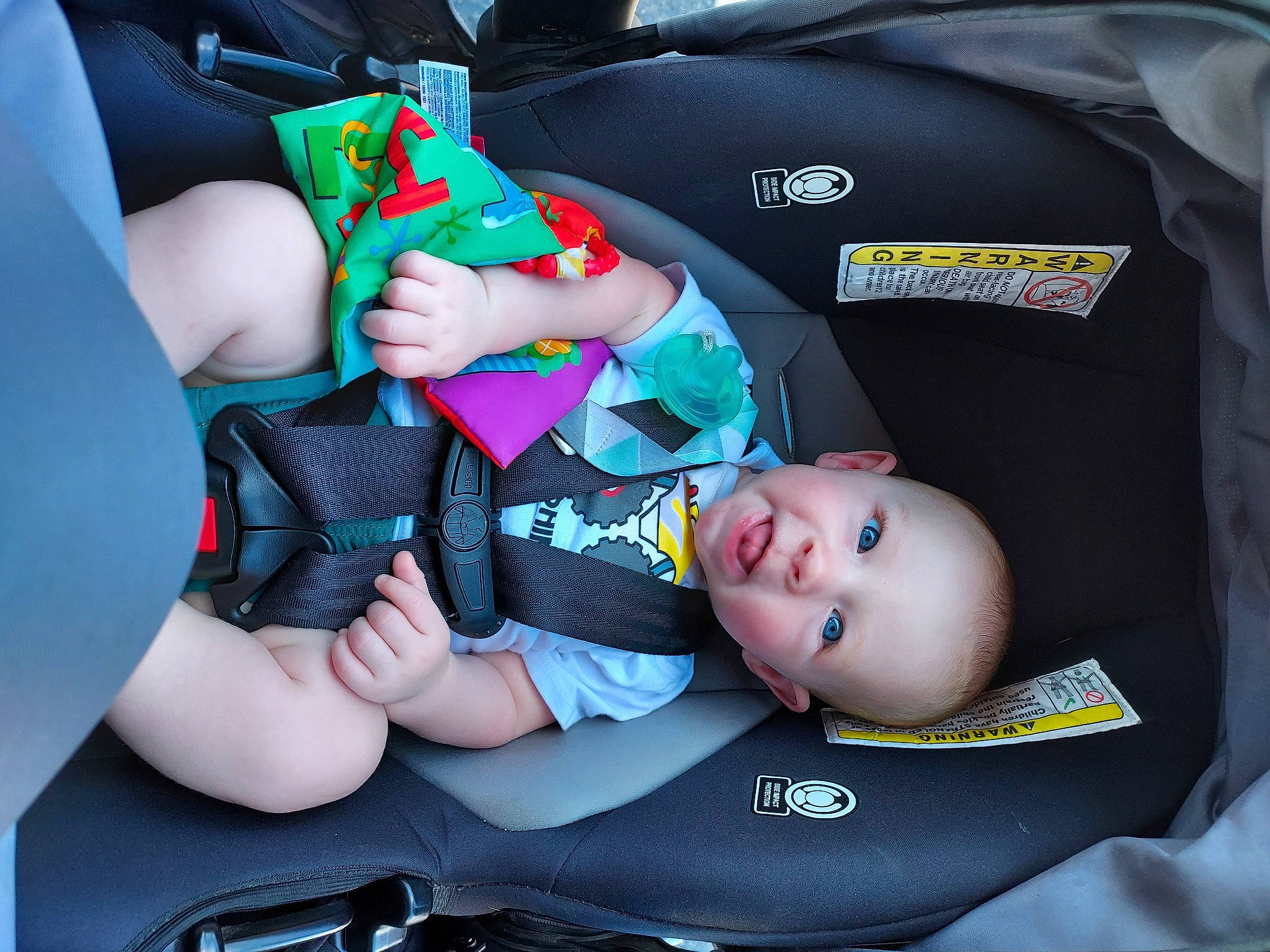 Wyatt joined the competition — help win amazing prizes! auto_part, baby, baby_carriage, baby_in_car_seat, baby_products, baby_safety, baby_toddler_clothing, car_seat, child, comfort, fashion_accessory, gesture, lap, nail, person, sitting, sleeve, sock, thumb, toddler
