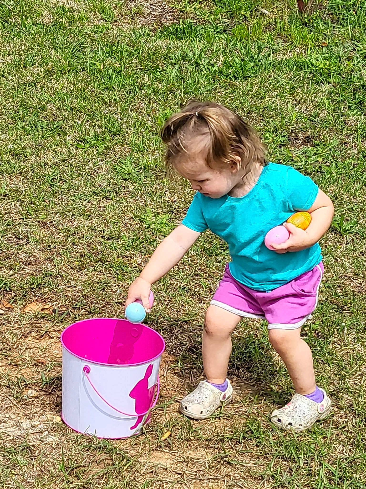 Harmonie joined the competition — help win amazing prizes! baby_toddler_clothing, ball, bucket, child, easter, fun, grass, happy, lawn, leisure, people_in_nature, person, plant, play, recreation, shorts, soil, t_shirt, toddler, water