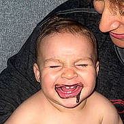 Zylan joined the competition — help win amazing prizes! adult, baby, child, chocolate, closeup, couch, emotion, face, family, hair, happy, indoor, joy, love, messy, mouth, person, portrait, skin, smiling