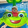 baby, blue_water, child, float, frog, fun, happy, hat, inflatable, outdoor, play, relaxation, smile, splash, summer, sunlight, swimming_pool, toy, vacation, water