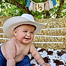 Enzo joined the competition — help win amazing prizes! baby, cowboy_hat, jeans, blanket, hay_bale, outdoor, greenery, smiling, crawling, child, milestone, banner, cute, portrait, happy, infant, nature, summer, skin, playful