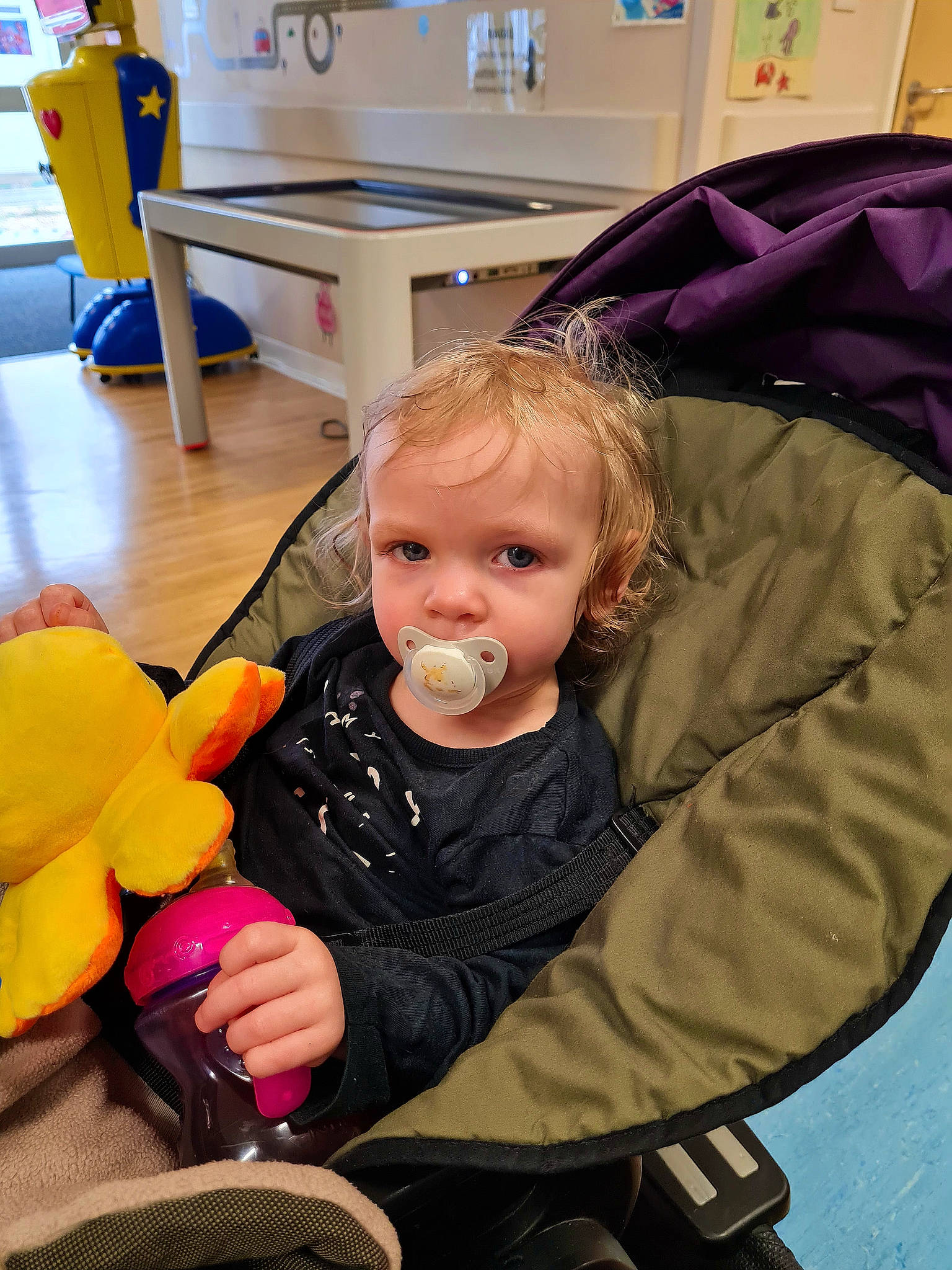 Rosealia is registered to the contest to win money with this photo: baby, chair, cheek, child, comfort, countertop, desk, face, flooring, fun, lap, people, person, product, room, sitting, skin, snapshot, table, thumb