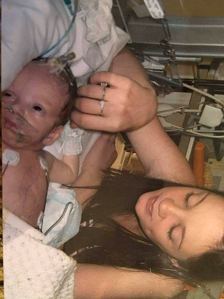 Erin is registered to the contest to win money with this photo: abdomen, cheek, chest, chin, comfort, eye, eyebrow, facial_expression, finger, fun, gesture, hand, happy, human_body, mouth, muscle, nose, person, skin, thumb