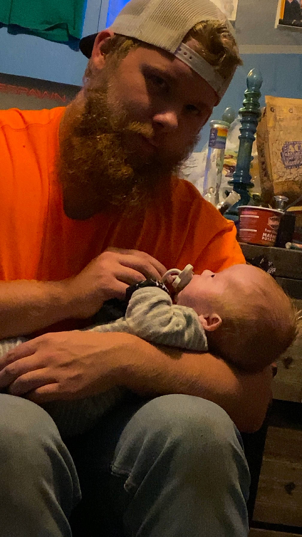 Kolton is registered to the contest to win money with this photo: abdomen, baby, beard, chest, child, chin, comfort, elbow, event, facial_hair, finger, human, lap, muscle, person, sitting, skin, thumb, toddler, trunk