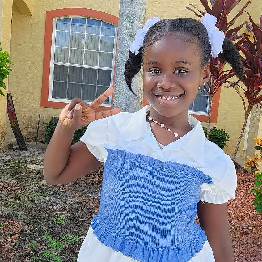 Abigahil is registered to the contest to win money with this photo: accessories, backyard, blouse, child, clothing, dress, face, female, girl, head, jewelry, nature, necklace, outdoors, person, photography, plant, portrait, pottedplant, yard