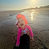 toddler, beach, sunhat, pink_clothing, water, sand, sunshine, ocean, happy, child, crawling, outdoor, sunlight, play, summer, reflection, vacation, nature, sky, shore