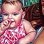 baby, child, thumb_sucking, ponytail, dress, floral_pattern, indoor, person, blue_eyes, couch, woman, hair, skin, face, smile, shoulder, colorful, portrait, furniture, young