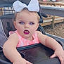 toddler, child, stroller, outdoor, bow, pink_dress, vampire_filter, face, purple_eyes, fangs, lipstick, hands, seat, trees, fence, cars, daylight, playful, cute, baby