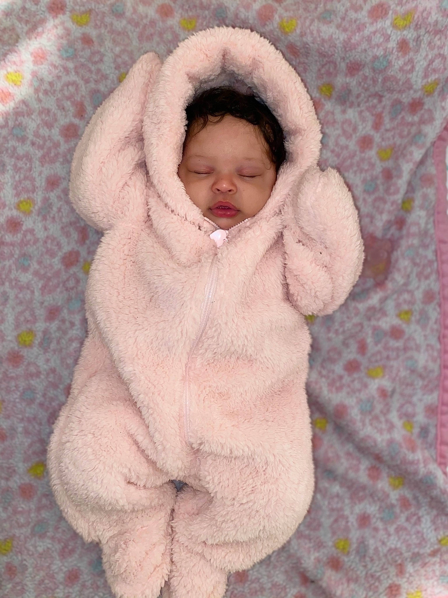 Treasure is registered to the contest to win money with this photo: baby, child, fur, fur_clothing, person, pink, skin, toddler, wool