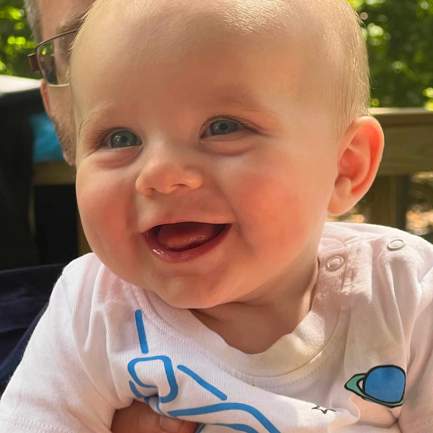 Tyler joined the competition — help win amazing prizes! accessories, baby, babylaughing, bodypart, clothing, face, glasses, happy, head, jewelry, laughing, mouth, necklace, person, photography, portrait, shirt, smile, t_shirt, teeth