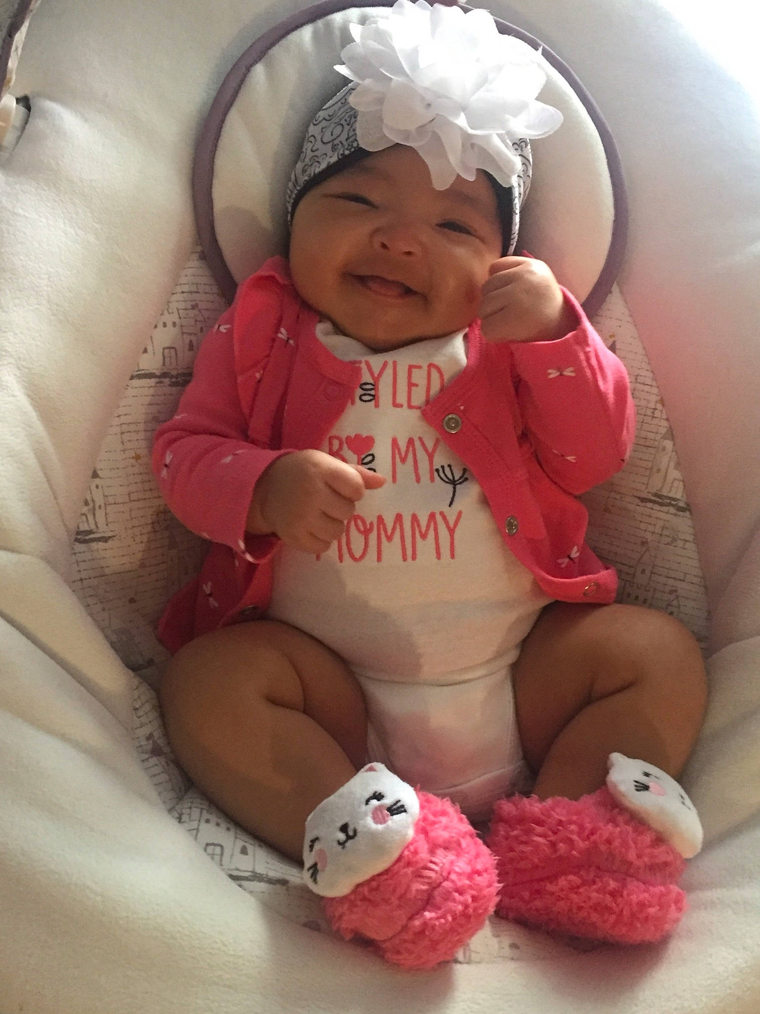 Aria is registered to the contest to win money with this photo: baby, baby_products, baby_sleeping, baby_toddler_clothing, cheek, child, headwear, person, pink, product, stuffed_toy, toddler