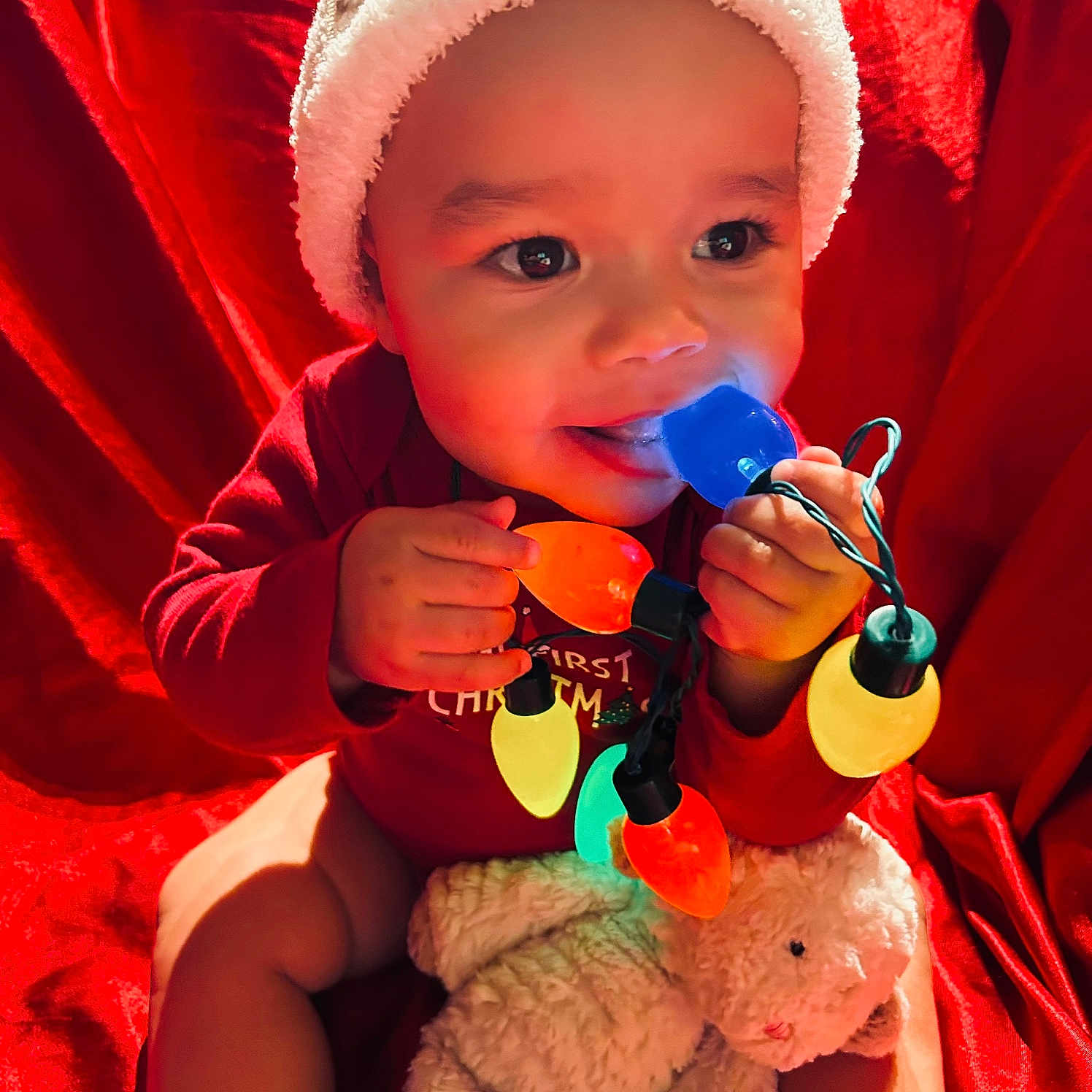 Kyrie joined the competition — help win amazing prizes! baby, bodypart, bonnet, cap, clothing, couch, eating, face, finger, food, furniture, hand, happy, hat, head, person, photography, portrait, smile, toy
