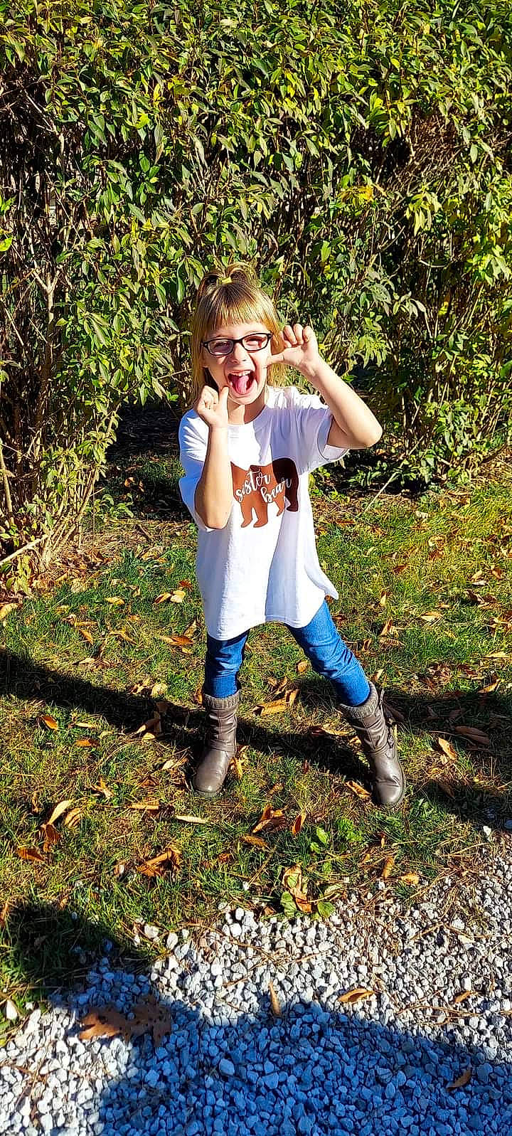Daisy joined the competition — help win amazing prizes! arm, blond, boot, child, child_model, denim, dress, footwear, fun, grass, jeans, leg, leggings, people_in_nature, person, photography, plant, riding_boot, shoe, smile