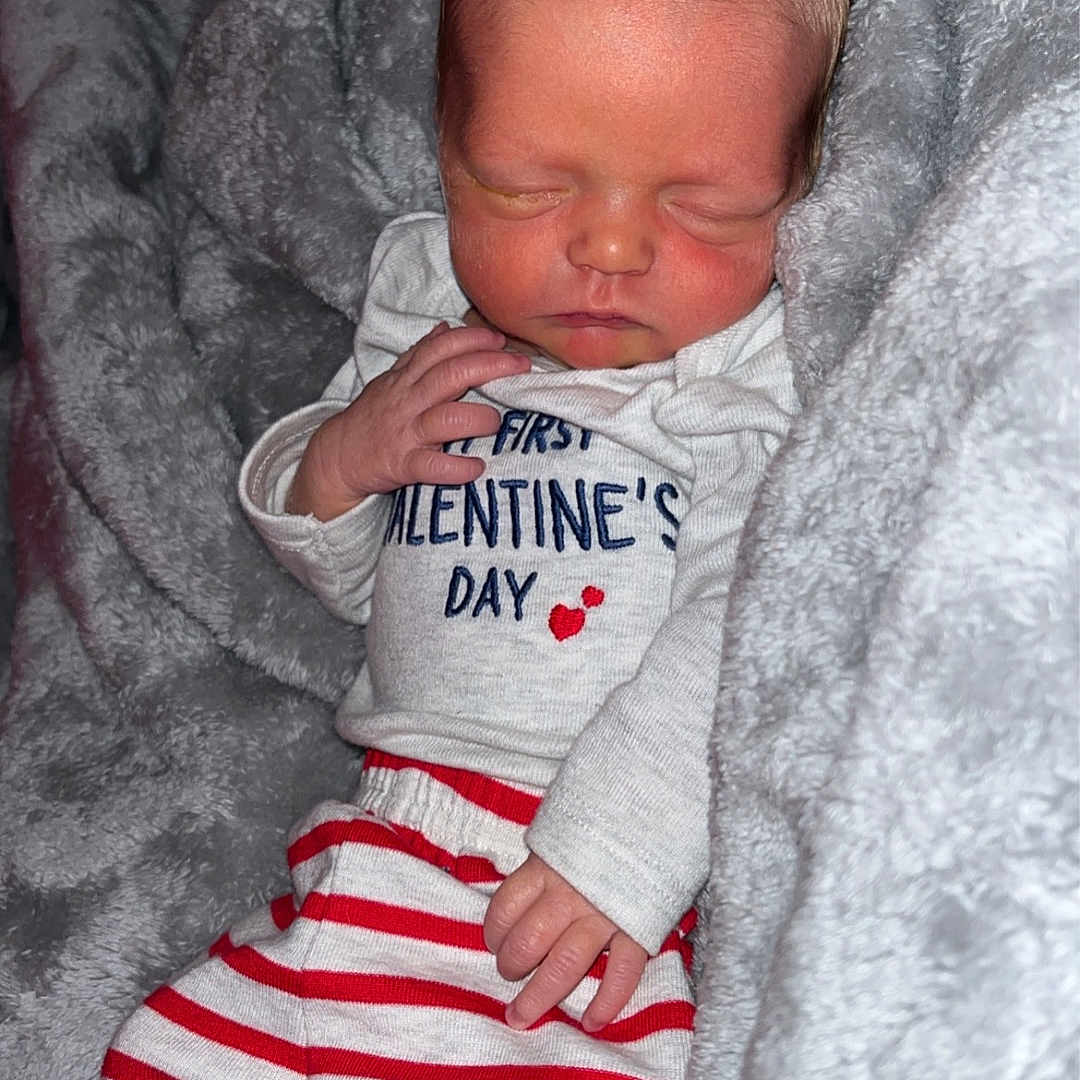 Skylar joined the competition — help win amazing prizes! architecture, baby, bed, bedroom, blanket, bodypart, building, clothing, couch, crib, cushion, face, finger, furniture, glove, hand, head, homedecor, hospital, indoors