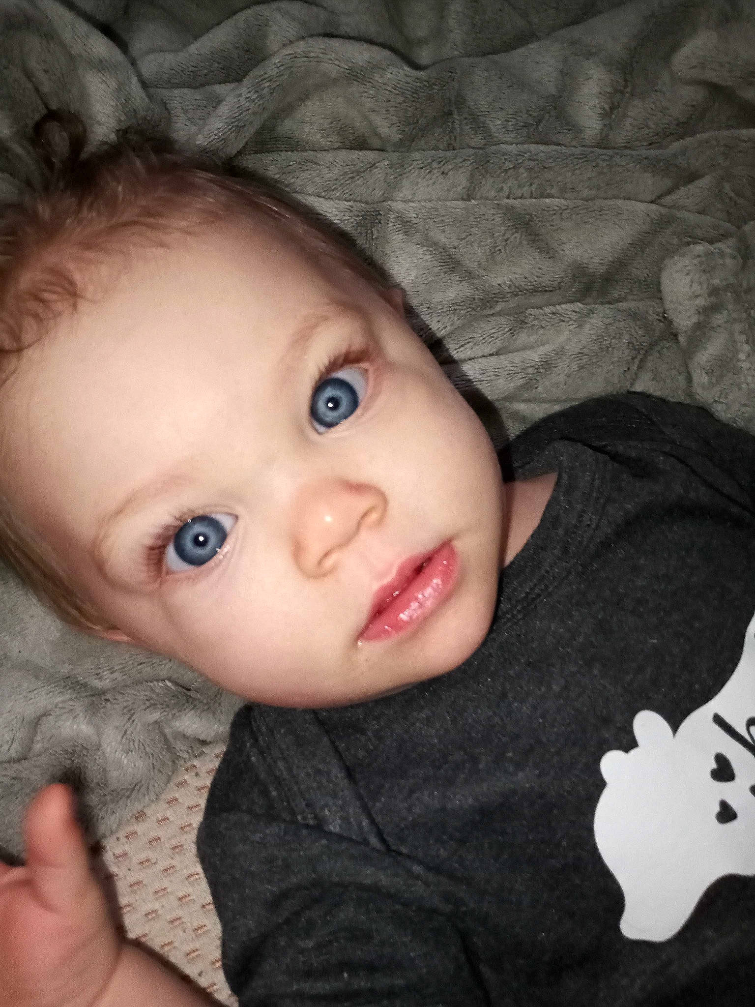 Ainsley is registered to the contest to win money with this photo: baby, cheek, chin, cool, eye, eyebrow, eyelash, finger, flash_photography, forehead, hairstyle, head, human_body, iris, lip, mouth, nose, person, skin, sleeve