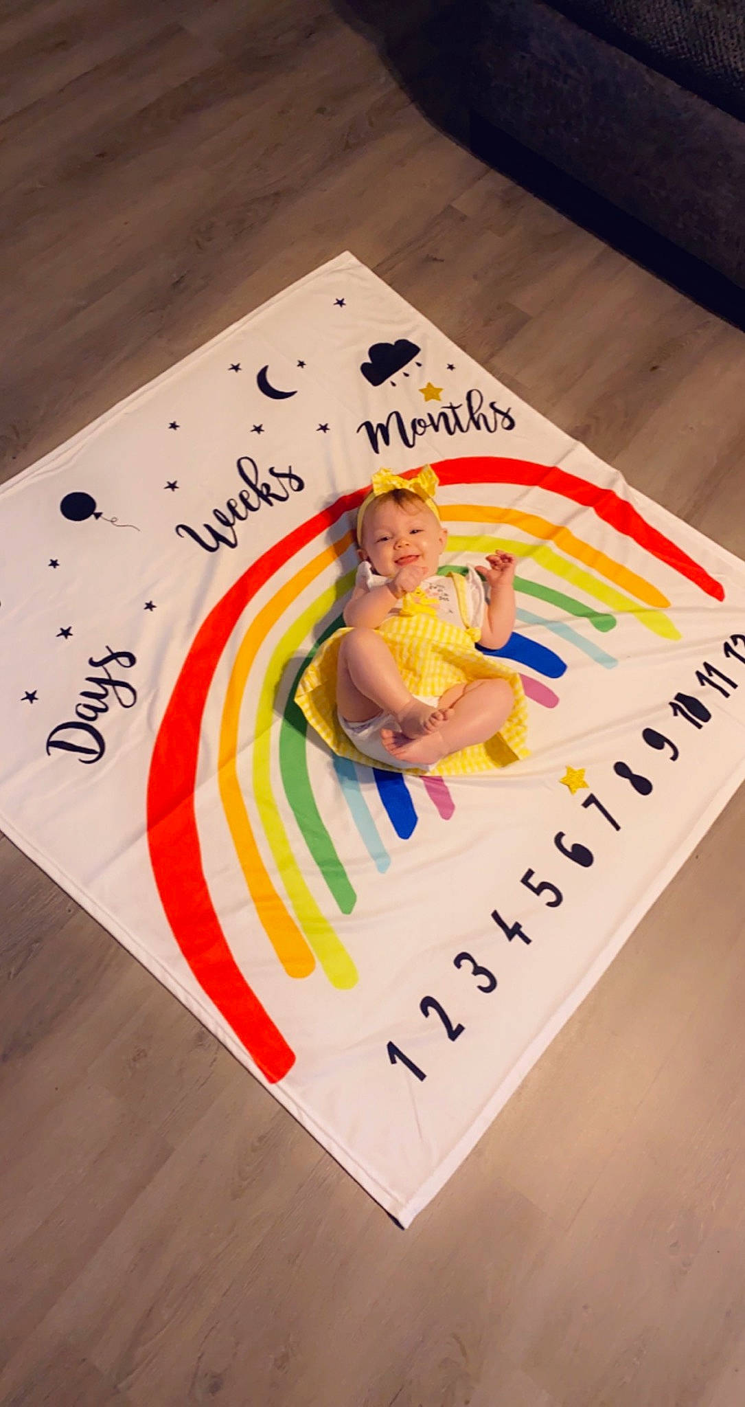 Ainsley is registered to the contest to win money with this photo: advertising, art, baby, child, circle, design, event, flooring, font, graphics, happy, illustration, paper, paper_product, pattern, person, publication, t_shirt, toddler, visual_arts