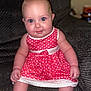Isabelle joined the competition — help win amazing prizes! baby, clothing, couch, cushion, dress, face, furniture, happy, head, homedecor, laughing, newborn, pants, pattern, person, photography, portrait, sitting, smile, standing