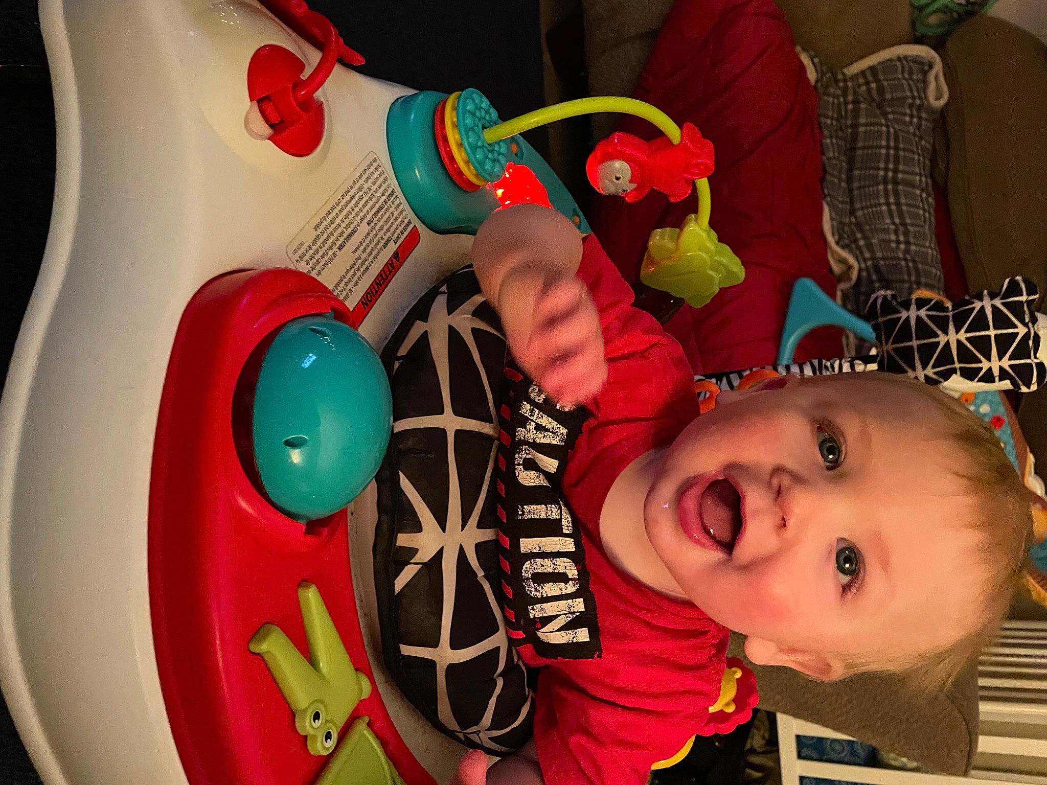 Kobe is registered to the contest to win money with this photo: automotive_wheel_system, baby, baby_toddler_clothing, baby_toys, balloon, birthday_cake, chair, child, event, fun, happy, nail, organ, party_supply, person, play, red, smile, toddler, toy