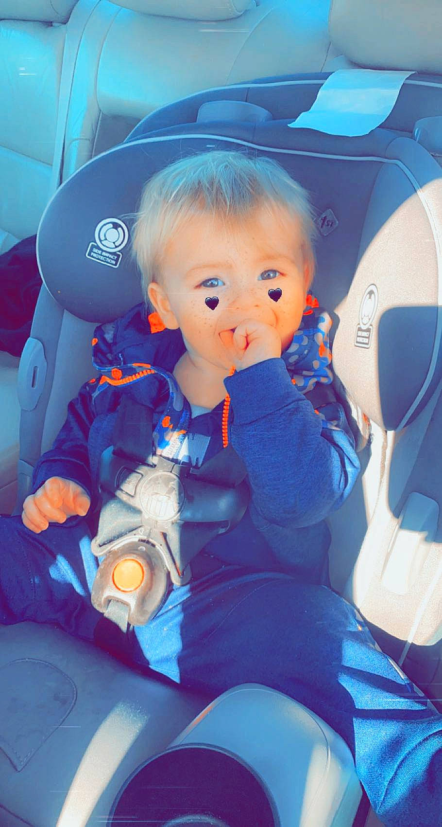 Bryson is registered to the contest to win money with this photo: auto_part, automotive_design, automotive_exterior, baby_in_car_seat, car, car_seat, car_seat_cover, child, comfort, electric_blue, family_car, head_restraint, motor_vehicle, person, personal_luxury_car, seat_belt, steering_part, steering_wheel, toddler, vehicle