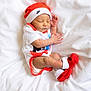 Messiah joined the competition — help win amazing prizes! baby, newborn, sleeping, hat, nike, red, white, clothing, socks, infant, cute, soft, blanket, sleep, rest, child, portrait, cozy, small, peaceful