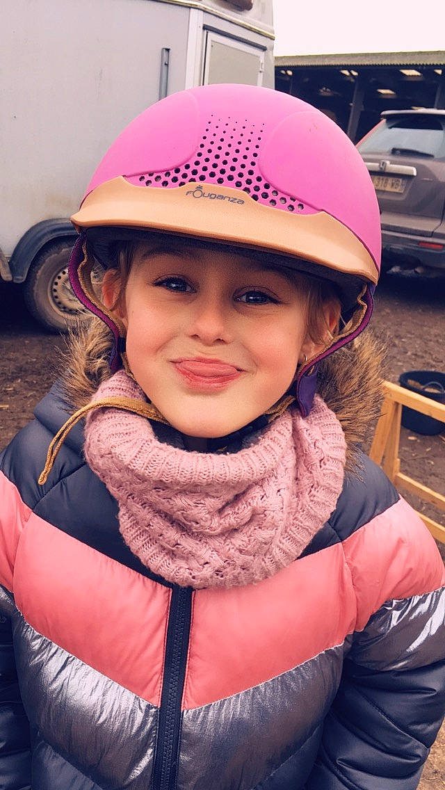Lindsay participe au concours pour gagner de l'argent avec cette photo : cap, child, clothing, fashion_accessory, hat, headgear, headwear, helmet, joy, neck, person, personal_protective_equipment, pink, toddler