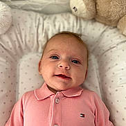Emy participe au concours pour gagner de l'argent avec cette photo : baby, buttoned_shirt, child, closeup, cozy, cushion, cute, face, happy, indoors, infant, lying_down, person, pink_shirt, plush_toy, portrait, smile, soft_texture, star_pattern, teddy_bear