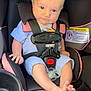 baby, car_seat, child, infant, seatbelt, pacifier, pink, black, clothing, foot, hand, hair, mohawk, sitting, safety, cute, indoor, person, straps, young