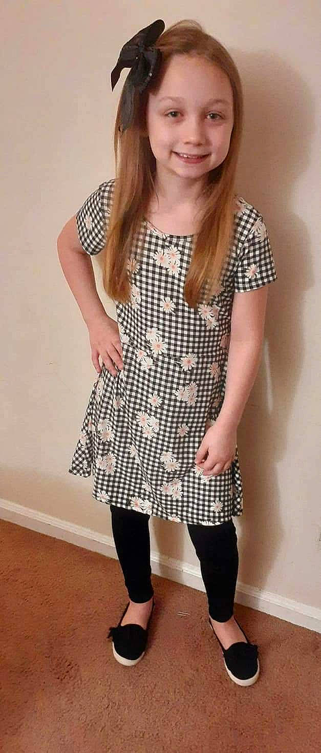 Madalynn joined the competition — help win amazing prizes! beige, clothing, design, dress, footwear, joint, joy, knee, leggings, neck, outerwear, pattern, person, plaid, shoe, shoulder, sleeve, tartan, textile, tights