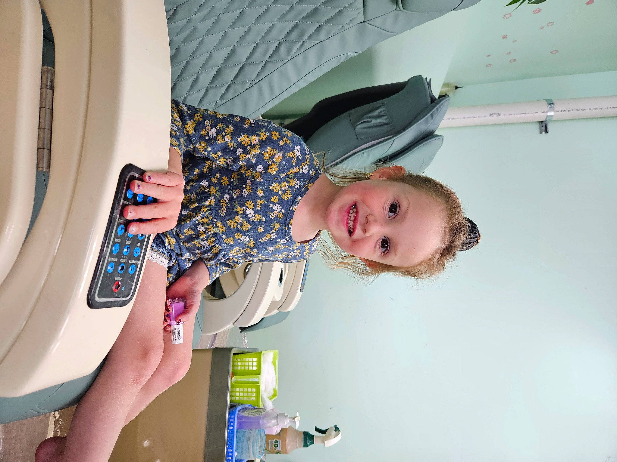 Madelyn is registered to the contest to win money with this photo: automotive_design, automotive_exterior, baby, child, comfort, electric_blue, fun, joy, laundry_room, leisure, luxury_vehicle, person, room, smile, toddler, trunk, vehicle_door