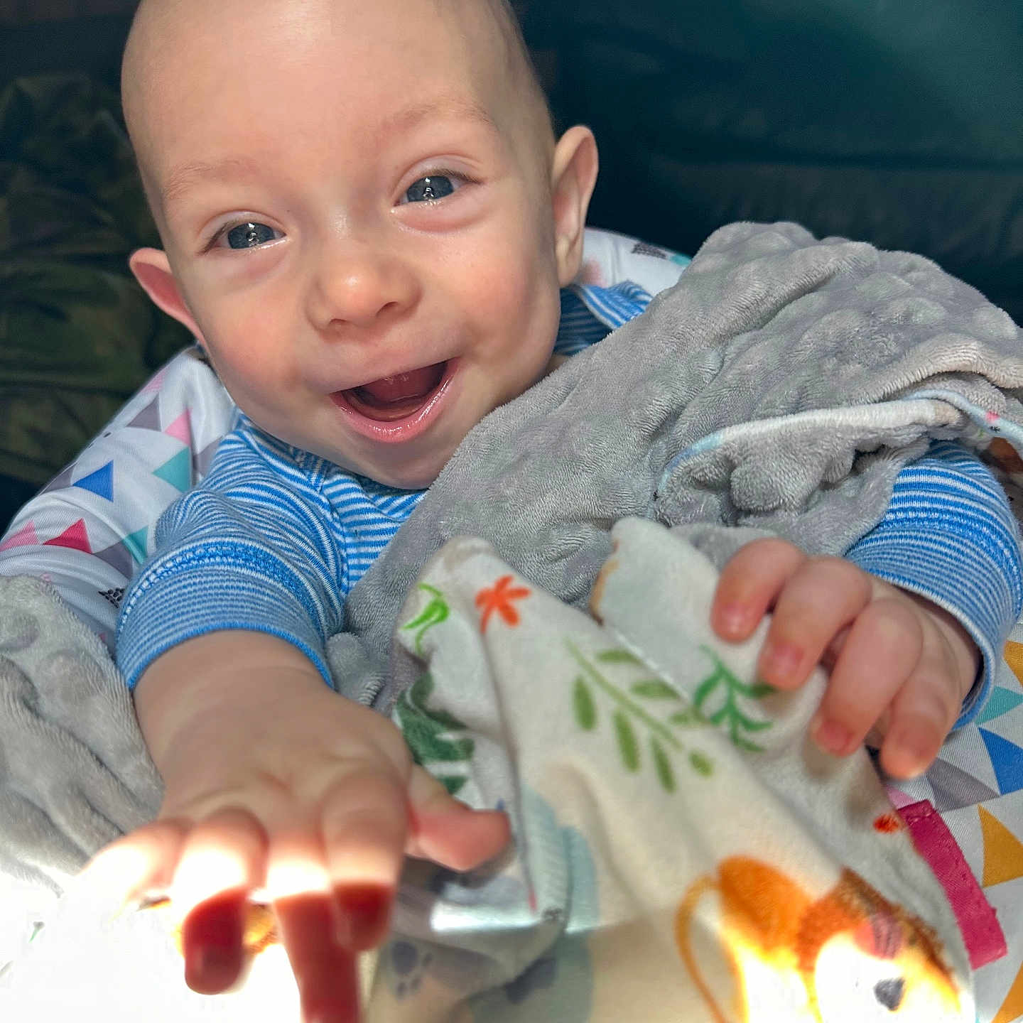 Randy joined the competition — help win amazing prizes! baby, babylaughing, blanket, bodypart, couch, cushion, face, finger, furniture, hand, happy, head, homedecor, laughing, newborn, person, photography, portrait, quilt, smile