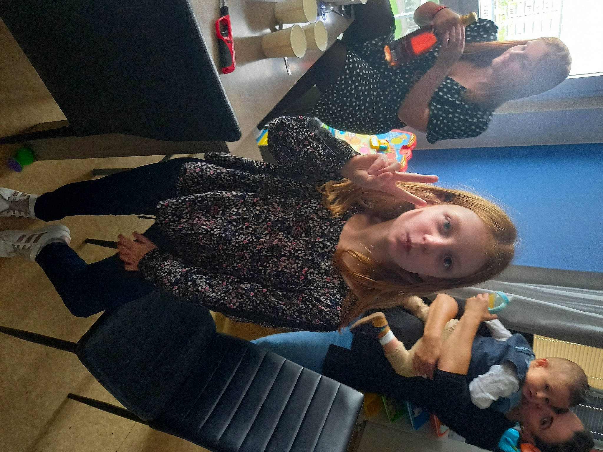 Madeline participe au concours pour gagner de l'argent avec cette photo : arm, black, chair, child, comfort, fashion_design, flooring, fun, hand, human_leg, joint, knee, leisure, person, room, sitting, thigh