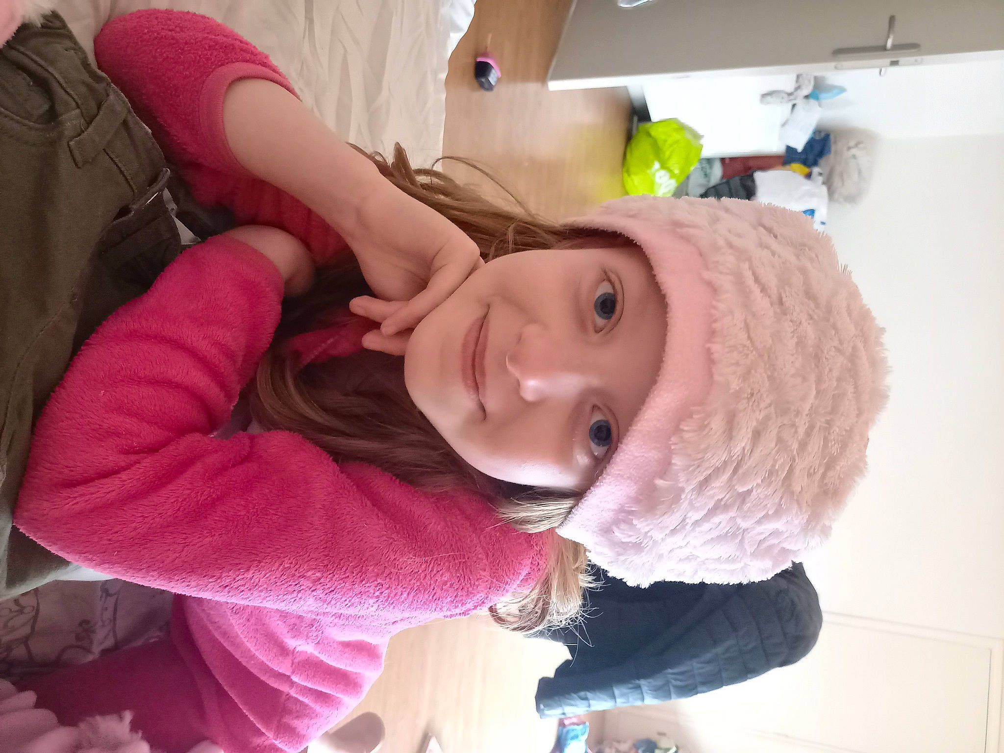 Madeline a rejoint le concours — aidez-le/la à gagner de superbes lots ! bangs, child, clothing, ear, eyebrow, eyelash, fashion_accessory, fun, fur, hair_coloring, happy, headwear, joy, long_hair, magenta, mouth, nose, person, pink, purple