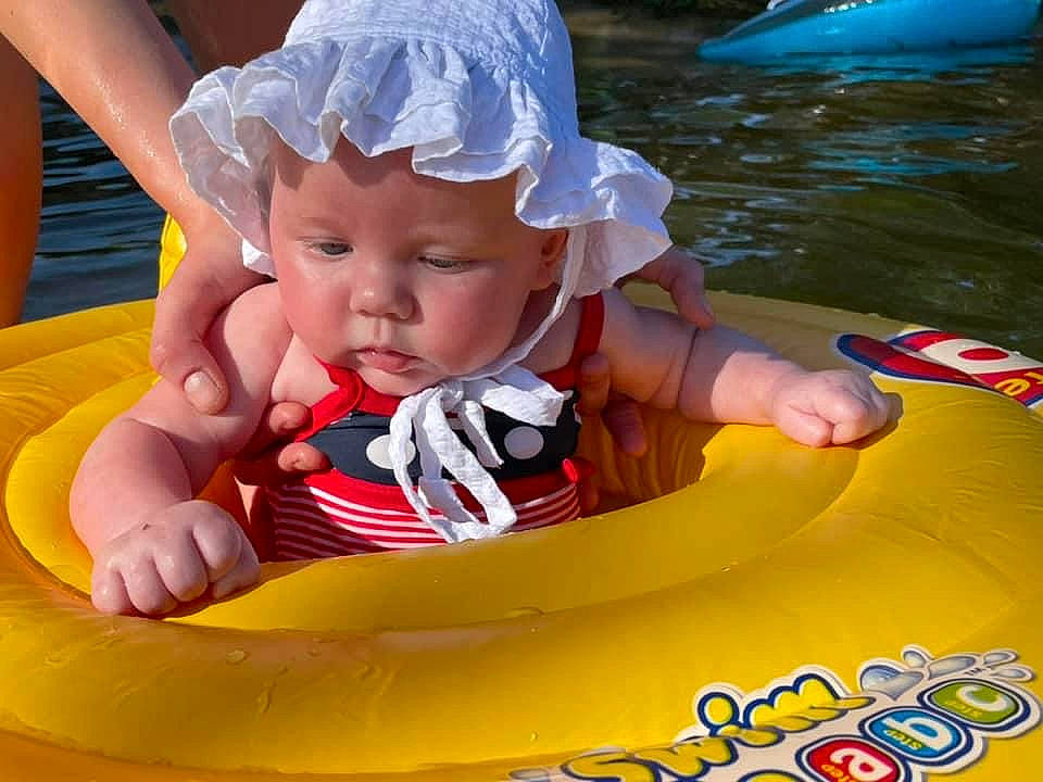 Aurora is registered to the contest to win money with this photo: baby, baby_float, baby_toddler_clothing, beauty, blue, child, fun, games, grass, happy, headwear, inflatable, leisure, light, person, pink, product, recreation, snapshot, toddler