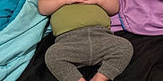 Emilio Ray joined the competition — help win amazing prizes! baby, bed, blanket, blue_blanket, child, clothing, feet, gray_pants, green_shirt, hands, head, indoors, infant, peaceful, portrait, purple_blanket, relaxation, rest, sleeping, soft