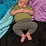 Emilio Ray joined the competition — help win amazing prizes! baby, sleeping, infant, bed, blanket, clothing, feet, hands, head, peaceful, rest, child, soft, purple_blanket, blue_blanket, green_shirt, gray_pants, indoors, portrait, relaxation