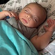 Emilio Ray is registered to the contest to win money with this photo: baby, bedtime, blanket, child, clothing, cozy, cute, drool, face, hand, head, indoors, infant, koala, nap, peaceful, pillow, rest, sleeping, soft